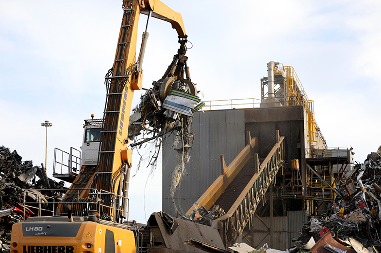 Machines at Schnitzer Steel take the large chunks of metal and send them to the shredder