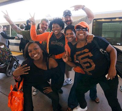 Giants fans waiting to board BART