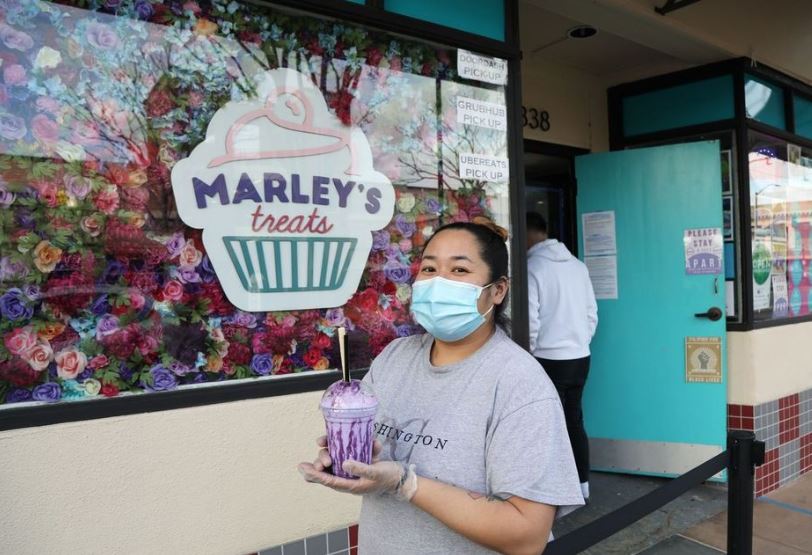 Gemma Ballesteros outside her Hayward bakery, Marley’s Treats, with an ube shake