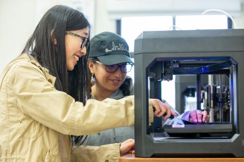 Bottom image: Stefanie Almendares works with a student from Aptos Middle School during a 3D printing workshop as part of CYC’s STEM program. 