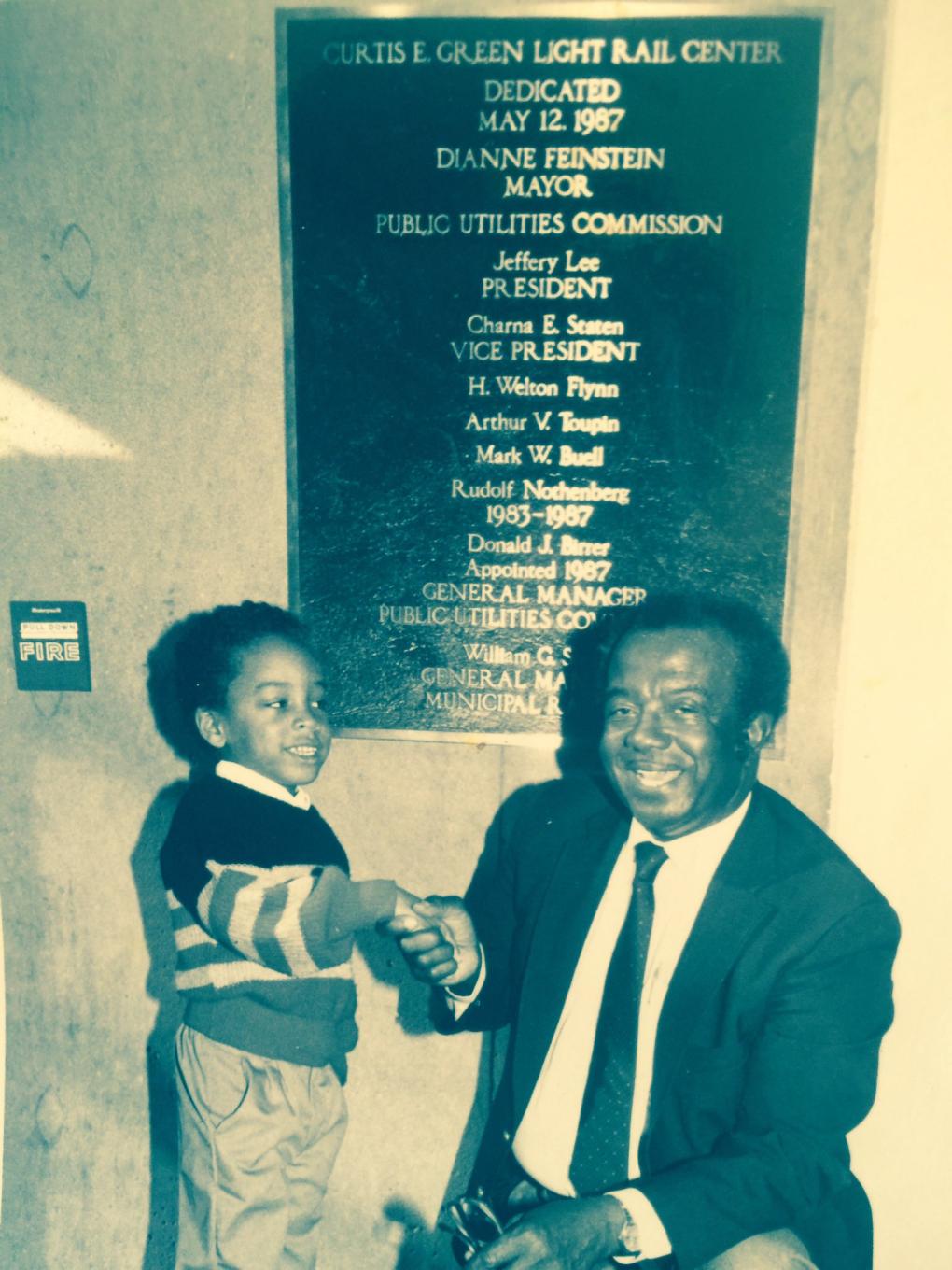 Dewayne Deams (left) with his great-grandfather Curtis E. Green at the dedication ceremony for the Curtis E. Green Light Rail Center.