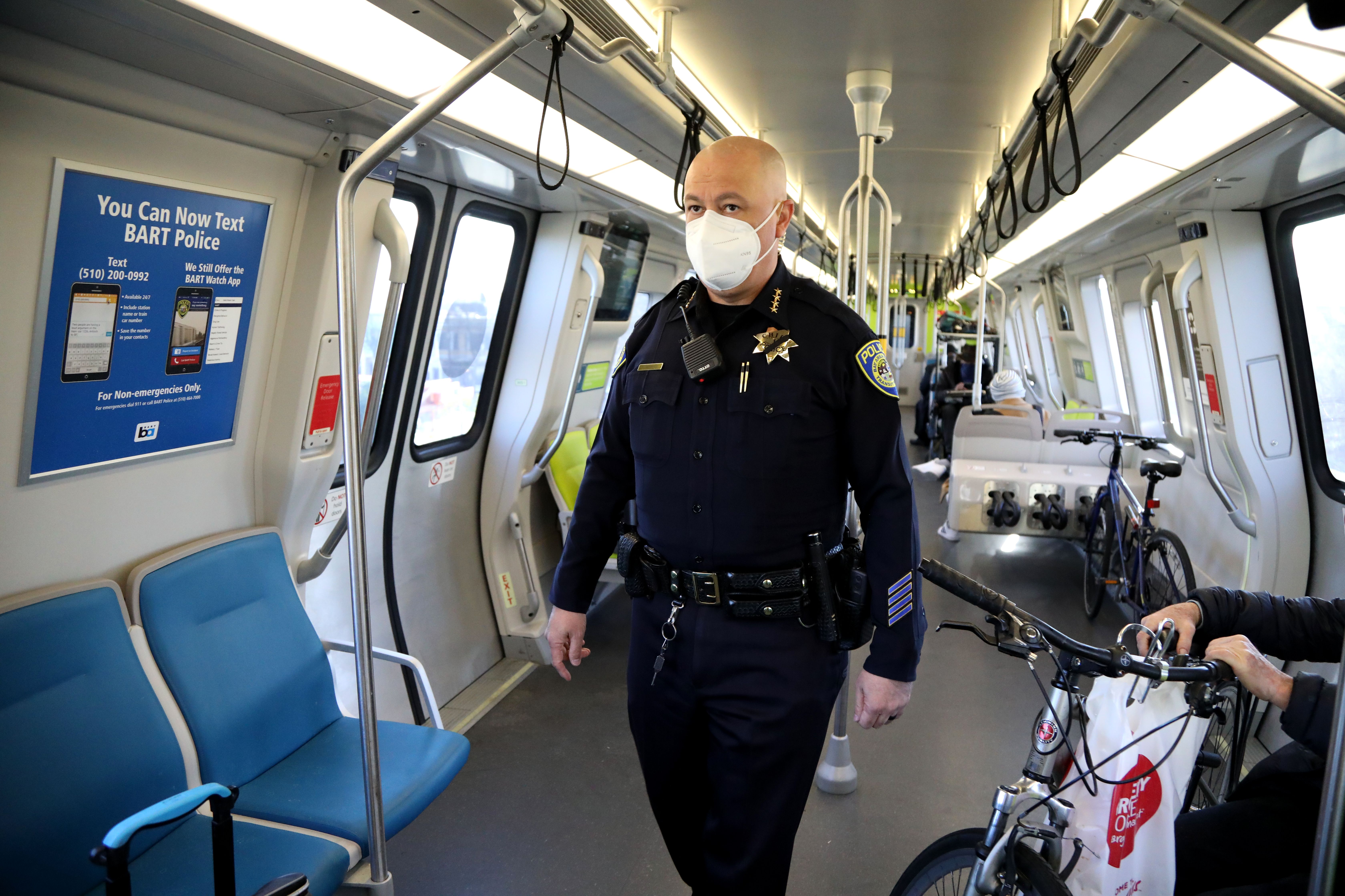 Chief Alvarez regularly walks trains to interact with passengers. Shown here on Feb. 1,  2021; note the poster at left behind bl