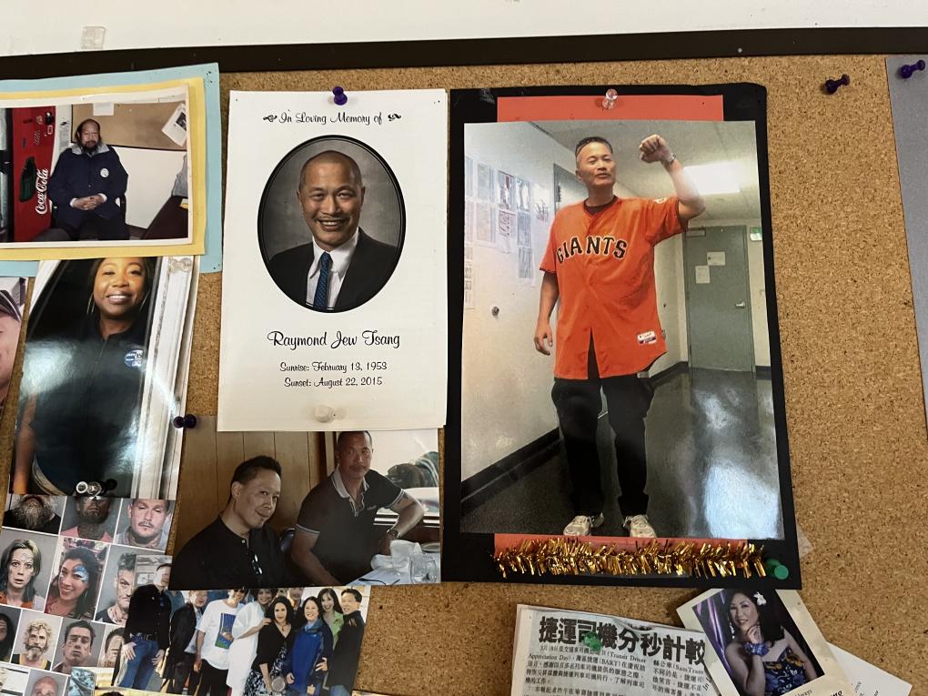 Raymond Jew Tsang is memorialized on the corkboard at Daly City Yard.  There is a photo of his memorial program and him wearing an orange Giants jersey with his fist raised.
