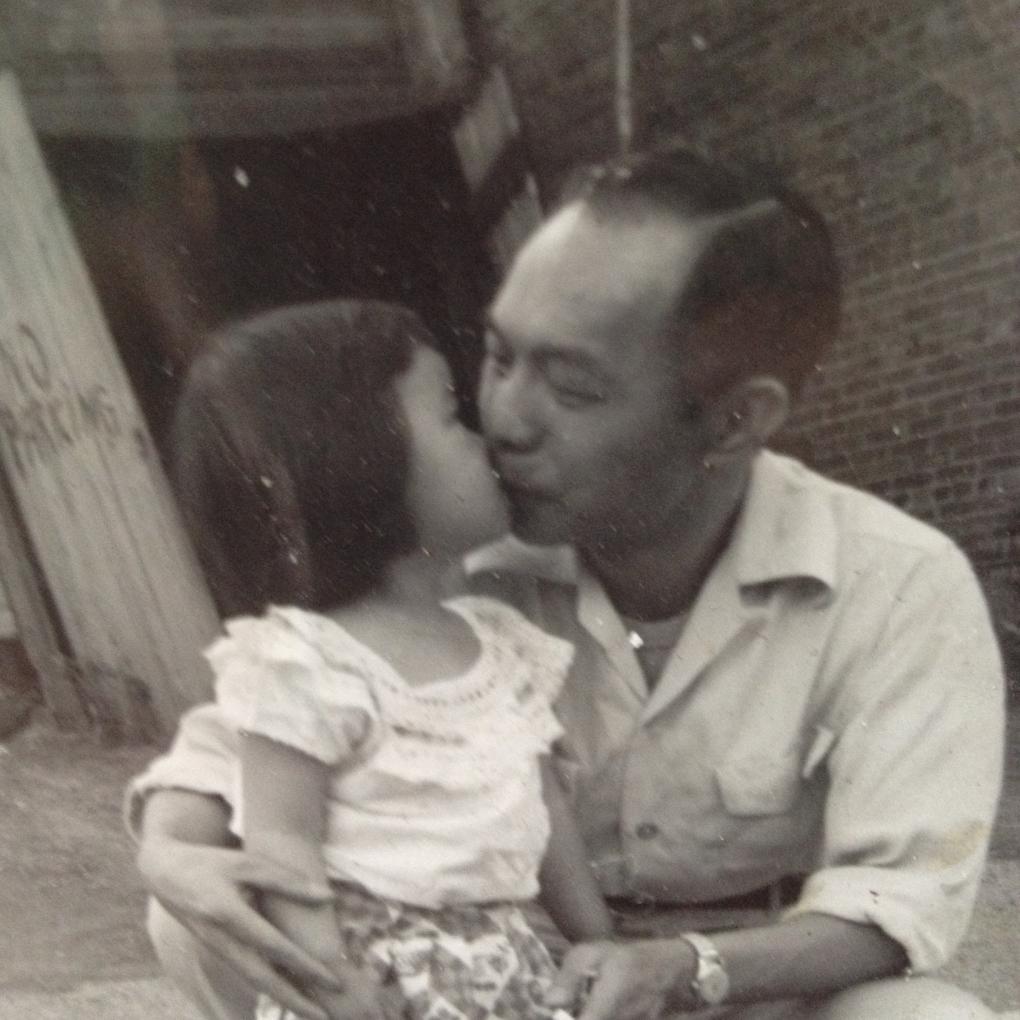 Mama Linda with her father, Dock Ong Yee, in a black and white photo circa 1960s.