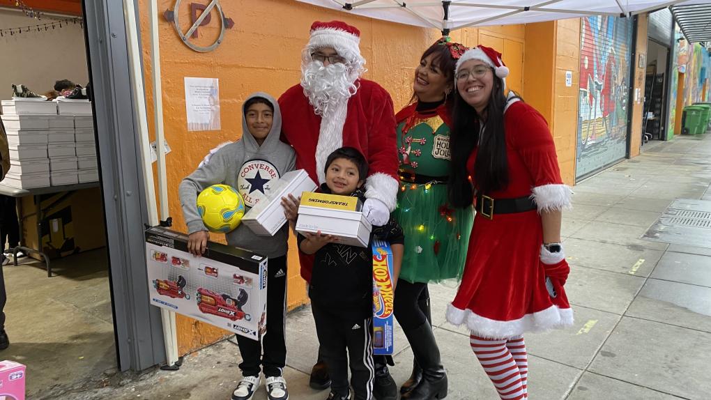 A photo of a previous year's toy giveaway at Mission Food Hub in San Francisco's Mission District.